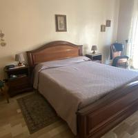 Camera da letto comó comodini arte povera legno