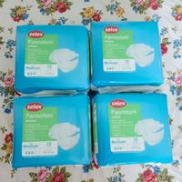 4 pacchi di pannoloni unisex tg medium