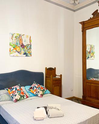 Letto una piazza e mezza con testiera imbottita