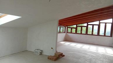 Appartamento nuovo con garage e terreno
