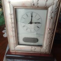 orologio da tavolo in foglia argento 800 e legno 