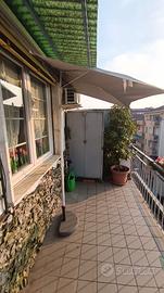 Ombrellone per parete terrazzo