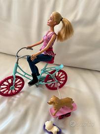 BARBIE CON BICI E CUCCIOLI