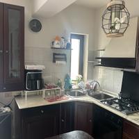 Cucina ad angolo in ciliegio