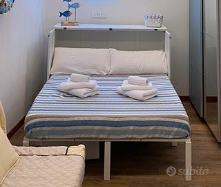 Letto pieghevole a parete