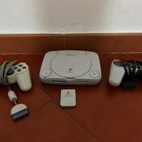 PlayStation one con 2 joystick e giochi