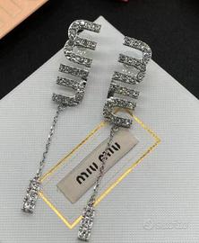 argentato orecchino Miu Miu