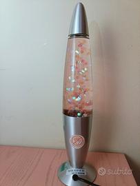 Lampada lava con luci led glitterate in rosa 