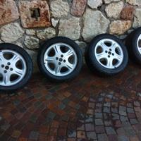 SET CERCHI IN LEGA DA 15 POLLICI A 4 FORI