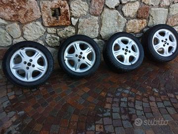 SET CERCHI IN LEGA DA 15 POLLICI A 4 FORI