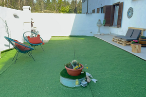 Casa con giardino e portico