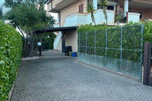 Villetta a schiera in parco privato