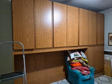 Armadio  a ponte con letto 