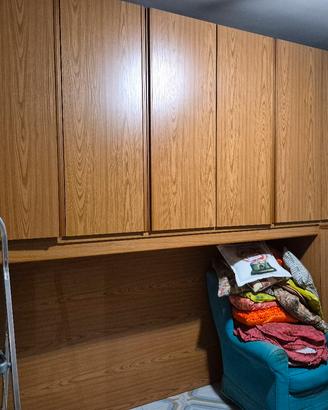 Armadio  a ponte con letto 