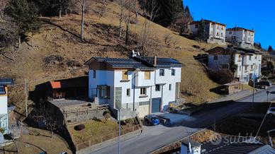 PORZIONE DI BIFAMILIARE A RAVASCLETTO