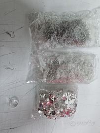 Kit per orecchini e anelli 3 confronta.