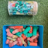 due kit con rolli e becchetti per capelli