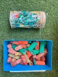 due kit con rolli e becchetti per capelli