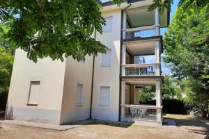 Bilocale con Terrazzo Abitabile e Posto Auto