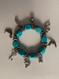 Bracciale con charms e pietre turchesi