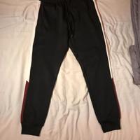 Tuta nera sportiva da uomo