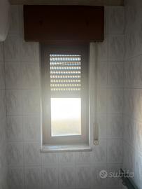 Porta finestre in legno