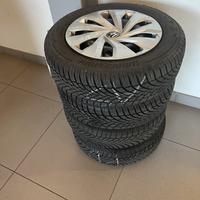 Bridgestone 4 pneumatici + cerchi e copriruote