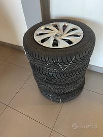 Bridgestone 4 pneumatici + cerchi e copriruote