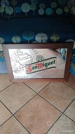 insegna a specchio di birra San Miguel 