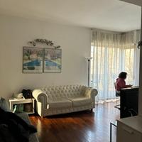 Divano classico pelle bianca matelassè