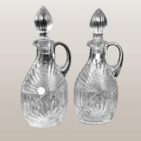 2 ampolle di vetro pressato vintage