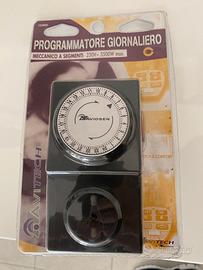 Programmatore giornaliero meccanico a segmenti