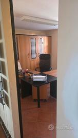 Stanza in studio professionale condiviso