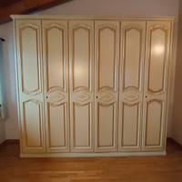 Camera da letto con armadio, comò e due comodini