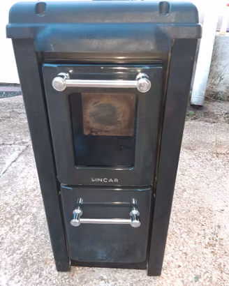 Stufa a legna 5,5 kw usata pochissimo scontata 50%