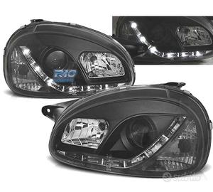 FARI OPEL CORSA B 93-00 LUCE DIURNA A LED FONDO NE
