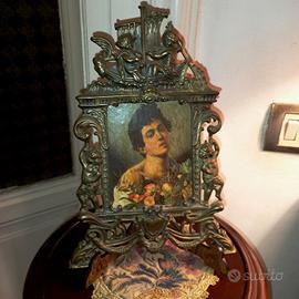 Antica cornice in bronzo 