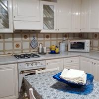 Cucina a L completa.