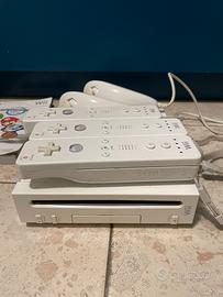 Nintendo Wii + controllers + giochi + chitarra