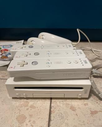 Nintendo Wii + controllers + giochi + chitarra