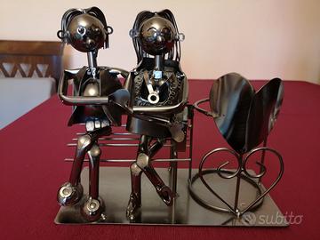 Portabottiglie scultura in metallo