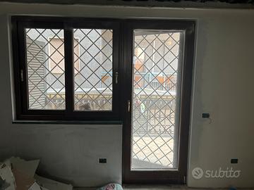 Infissi alluminio legno e grata