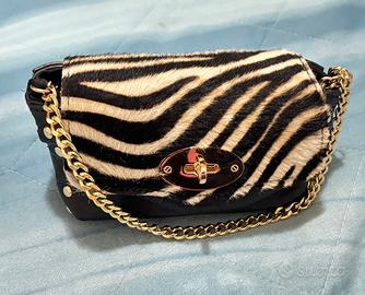 Borsa piccolina in vera pelle.