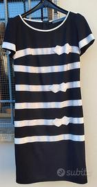 Abito nero invernale con elementi bianchi