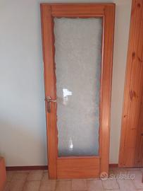Porte in legno noce complete di cornice