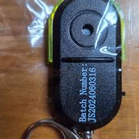 Portachiavi che si illumina e suona con un fischio