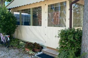 Roulotte con annessa casetta in legno e veranda