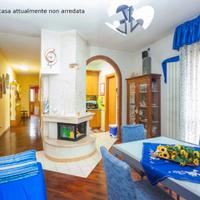 Luminoso Appartamento con Giardino e Garage