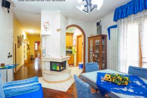 Luminoso Appartamento con Giardino e Garage