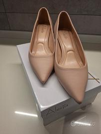 décolleté Alesya  color nude come nuove